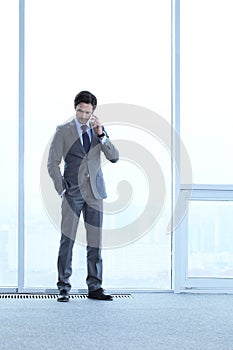 Businessman talking by phone