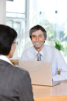 Businessman talking to client