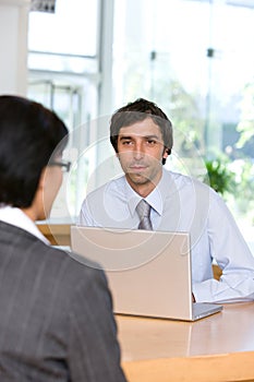 Businessman talking to client