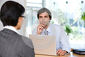 Businessman talking to client