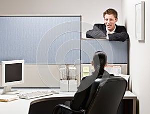 Businessman talking to co-worker photo