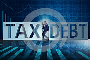 The businessman in tax and debt concept