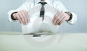 Businessman tearing contract. Business concept