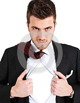 Businessman tearing his shirt