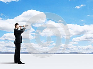 Businessman with telescope