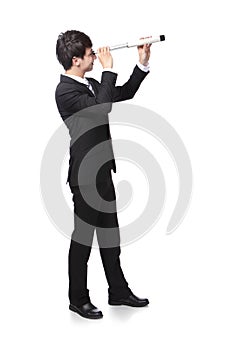 Businessman with telescope looking forward