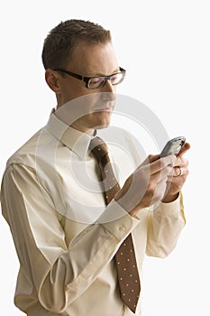 Businessman Texting on a Cell Phone - Isolated