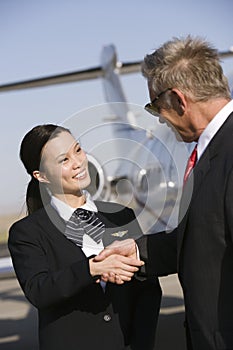 Businessman Thanking Stewardess photo