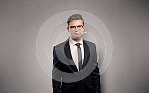 Businessman with thermometer and copy space