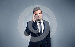 Businessman with thermometer and copy space