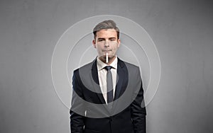 Businessman with thermometer and copy space