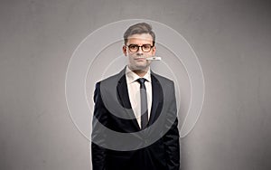 Businessman with thermometer and copy space