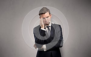 Businessman with thermometer and copy space