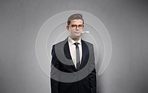 Businessman with thermometer and copy space