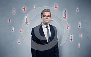 Businessman with thermometer and fever concept