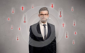 Businessman with thermometer and fever concept