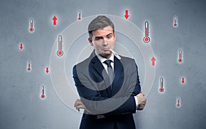 Businessman with thermometer and fever concept