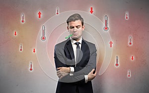 Businessman with thermometer and fever concept