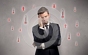 Businessman with thermometer and fever concept