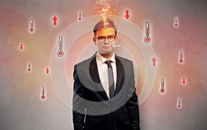 Businessman with thermometer and fever concept