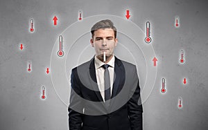 Businessman with thermometer and fever concept