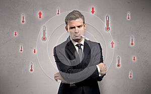 Businessman with thermometer and fever concept