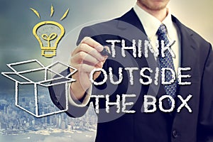 Businessman with think oustide the box