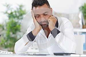 businessman thinking in office photo