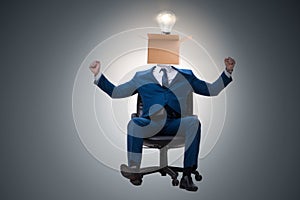 The businessman in thinking out of box concept