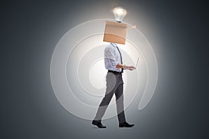 The businessman in thinking out of box concept