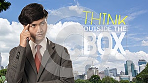 Businessman thinking and think outside the box