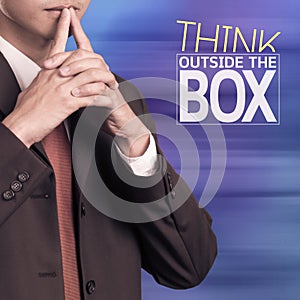 Businessman thinking and think outside the box