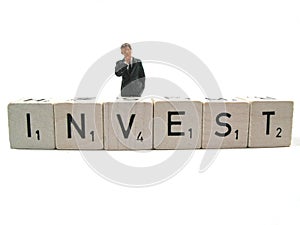 Businessman thinking where to invest