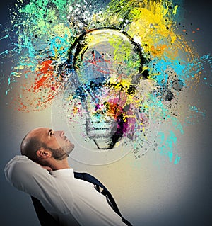 Businessman thinks of a new creative idea
