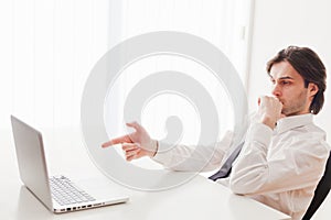 Businessman threatening gesture