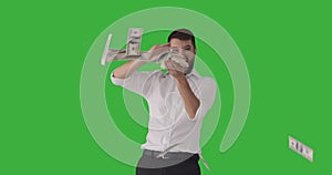 Businessman throwing banknotes in air