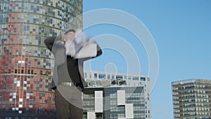 Businessman throwing documents on street. Joyful worker celebrating victory