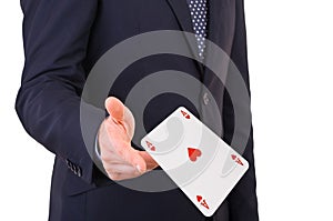 Businessman throwing playing cards.