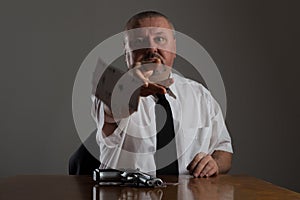 Businessman throwing playing cards.