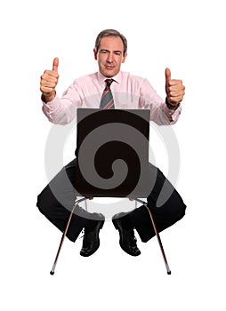 Businessman with thumbs up