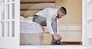 Businessman, tie laces and getting ready in home, consultant and employee dressing for work. Male person, professional