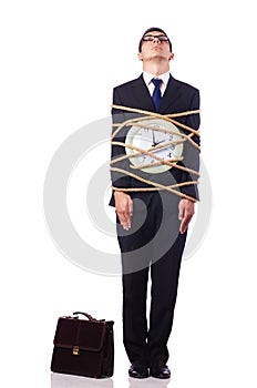 Businessman tied up with rope