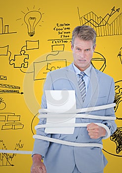 Businessman tied up with rope and paper against business graphic icon