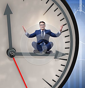 Businessman in time management concept