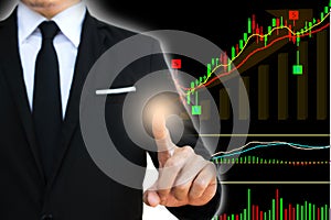 Businessman touch on vitual screen with Stock charts showing growing revenue