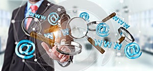 Businessman touching 3D rendering contact icon and magnifying glass in his hand