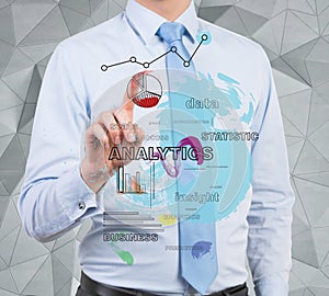 Businessman touching analytics