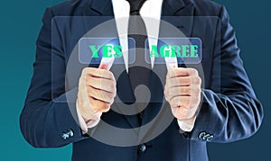 Businessman touching check virtual button. Concept of business decision yes and agree photo