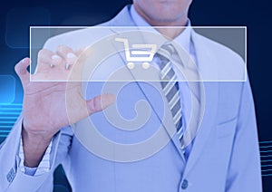 Businessman touching digital interface of online shopping