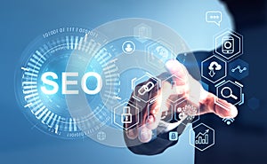 Businessman is touching digital interface with seo, search engin